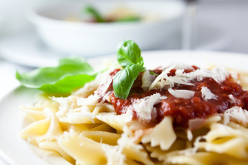 Pasta with tomato sauce and parmesan