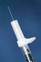 The tip of a needle or syringe.