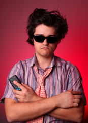 Fashion boy with TV remote control