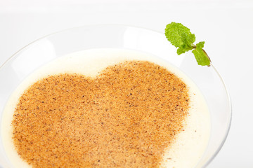 Milk alcohol cocktail with heart decoration