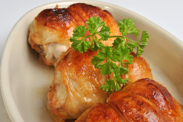 roasted chicken olive in a white bowl