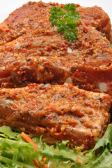 some marinated organic rib on healthy salad