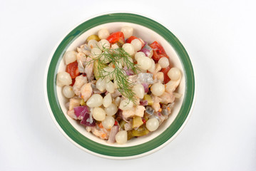 some fresh organic herring salad  in a bowl