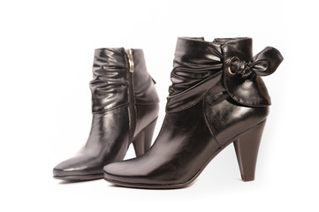 Black boots on white