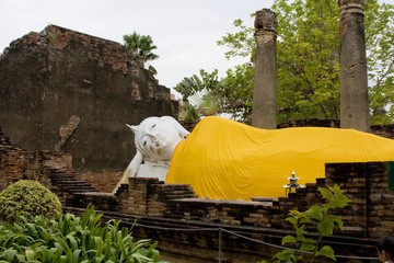 Stone statue of a Buddha in Ayutthaya, Thailand.