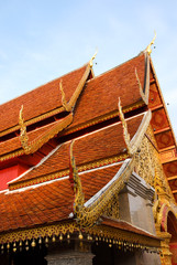 Fototapeta na wymiar Temple roofs of Wat Phrathat Doi Suthep in Thailand