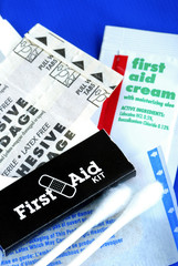 List of items in a First Aid Kit isolated on blue