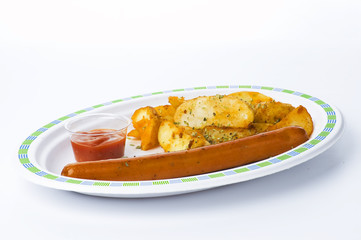 Sausages, fried potatoes and catsup