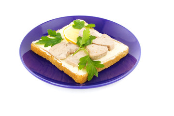 Fototapeta na wymiar sandwich toast, cod liver, slices of lemon isolated on white