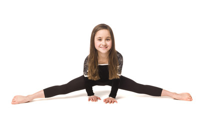 Young girl doing gymnastics