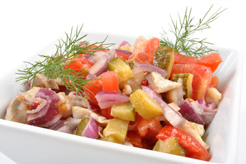 some fresh organic herring salad with tomato