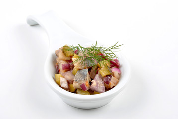 some fresh organic herring salad with tomato