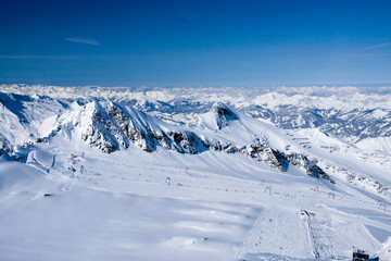 Obraz premium Ski lifts in alps mountains