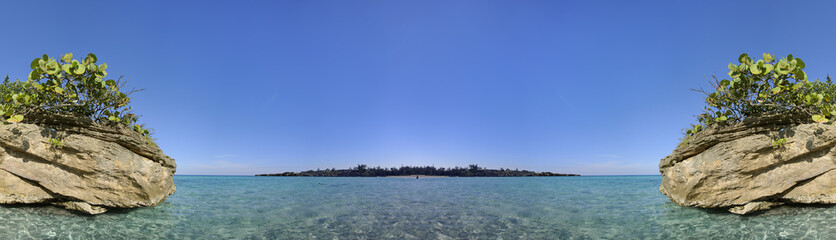 Panoramic view of tropical seascape with island in the back