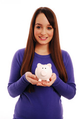 Girl holding piggy bank