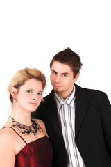 Portrait of well-dressed young couple, studio shot