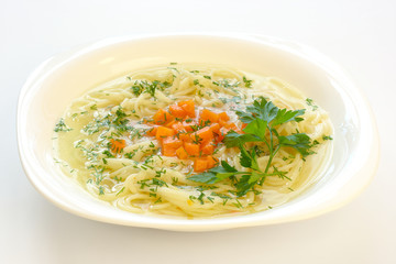 Chicken soup with spaghetti