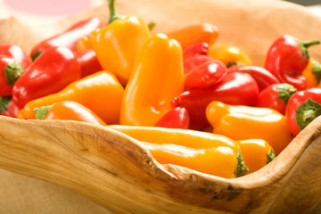 Mixed peppers in wood bowl