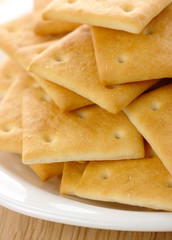 Yellow cookies on plate