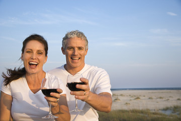 Couple Drinking Wine on Beach