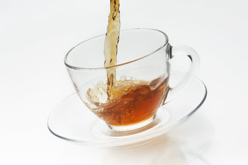 Cup with tea on white background