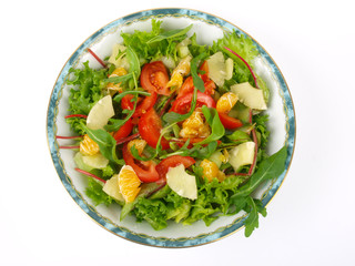 Green salad with cucumber and tomatoes.