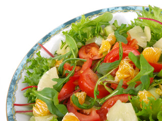 Green salad with cucumber and tomatoes.