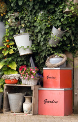 Garden wall with planters and decorative boxes