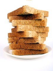 Sliced bread close up on a white plate
