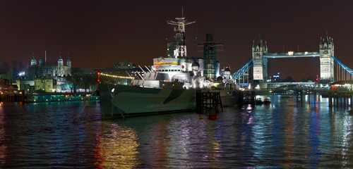 London Tower Bridge and HMS Bellfast at night