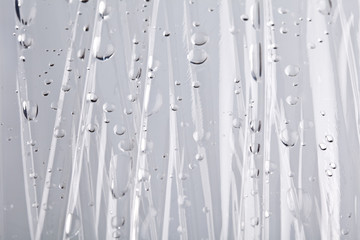 Water drops on cellophane as a background