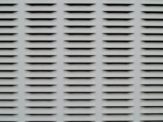 Gray and black metal ventilation grate background