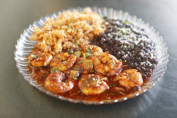 Mexican style shrimp dinner with rice and beans