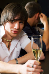 Young man relaxing in a bar.