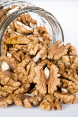 walnuts in Glass Jar isolated on the white background
