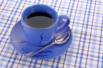 Blue cup of tea on the the table