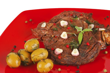 beef slices on red dish