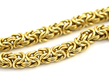 Obraz premium gold chain on the white background