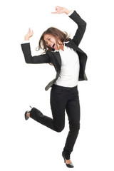 ecstatic businesswoman in suit dancing