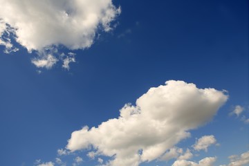 Blue beautiful sky with white clouds  in sunny day