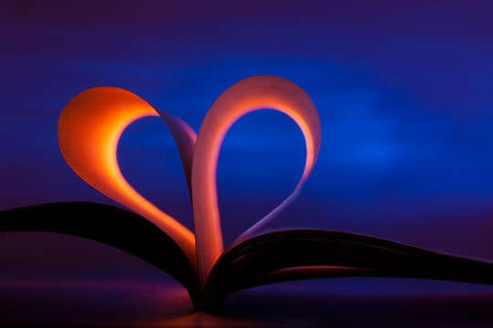 Open book in heart shape