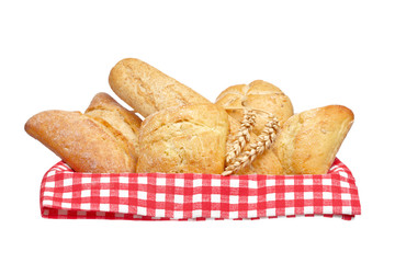 Crusty bread buns into the basket