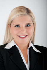 Young business woman in a black suit