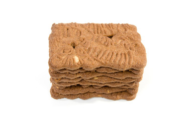Dutch speculaas biscuit cake over white background