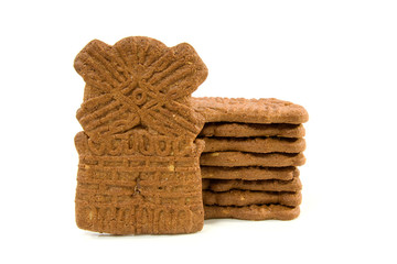 Dutch speculaas biscuit cake over white background