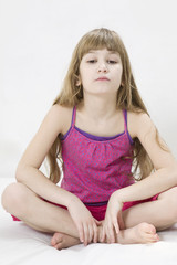 little cute girl doing yoga