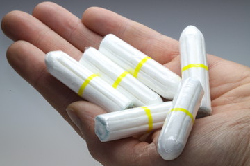 Hand with tampons