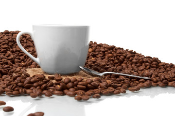 Cup with coffee, costing on coffee grain