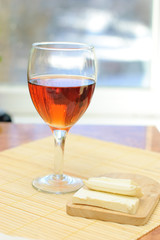 A glass of rosy wine