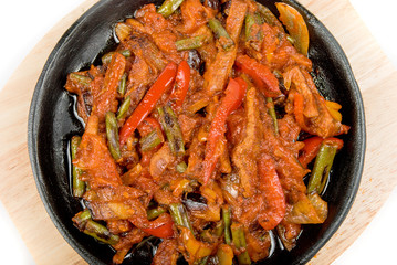 meat and vegetables at pan